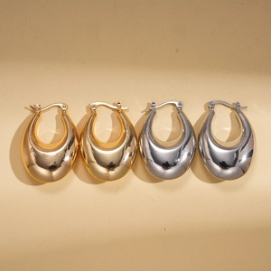 Minimalist geometric teardrop earrings in polished gold and silver metal finishes