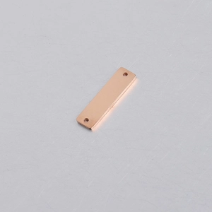 Close-up of a 6x22mm rose gold rectangle stainless steel pendant with double holes