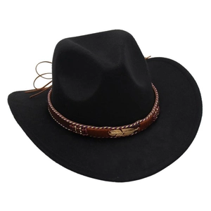 Detail of black cowboy hat with braided brown band and golden feather metallic ornament