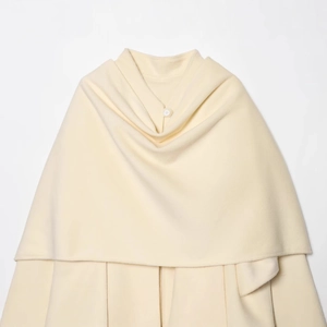 French style cream wool blend layered shawl coat with a single white button closure