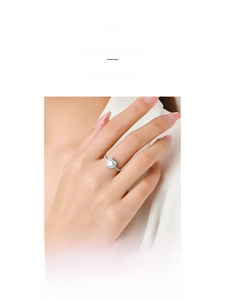 Macro detail of S925 silver ring featuring a light blue heart-shaped zircon centerpiece