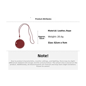 Detail view of round red faux leather necklace pendant with specs 82cm length and 20.6g