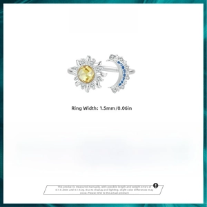 Macro detail of sun and moon ring showing 1.5mm width and 2g weight specifications