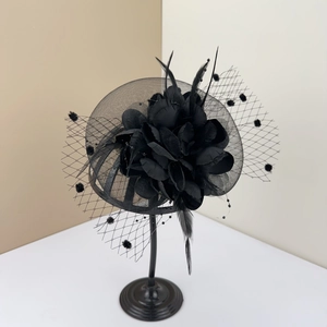 Elegant black French fascinator hat with 3D flowers, feathers and polka dot mesh veil
