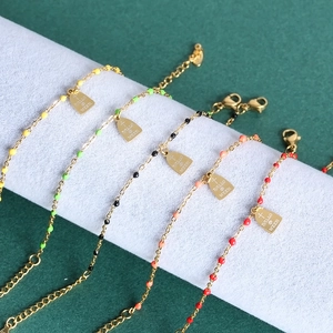 Halloween beaded bracelets with gold tombstone charms and colorful stainless steel accents