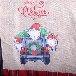 Chemin de table Noël avec gnomes sur camion bleu et bordure à carreaux rouges, 180cm