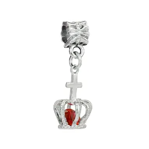 Detailed silver crown and cross charm with red gemstone and bow engraved slider