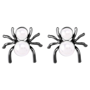 Macro detail of gothic spider earrings with white pearls and black plated metal legs