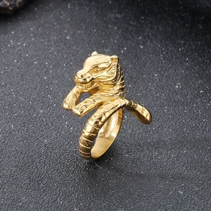 Macro view of gold punk tiger ring showcasing intricate details and metal texture