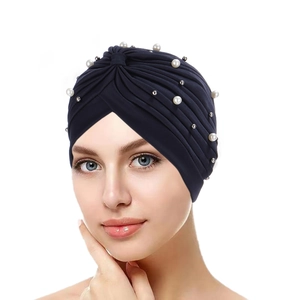 Elegant navy blue pleated turban hat for women decorated with glossy white pearls