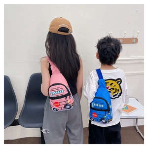 Kids school bus chest bag in pink and blue worn by children in outdoor setting