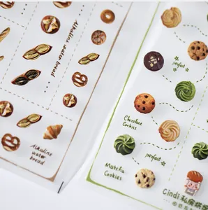 Macro shot of realistic bakery stickers featuring pretzels, croissants and cookies
