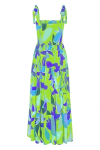 Detail of smocked chest and tie straps on vibrant green floral tiered maxi dress