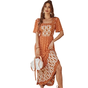 Bohemian floral print midi dress with square neck and side slit in orange and beige