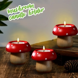 Detailed view of mushroom-shaped wooden candle holders with warm tea lights on a table