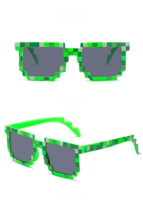 Macro shot of green checker pixelated frame and dark lenses of the novelty sunglasses