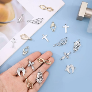 Silver and gold alloy mixed charms set with cross, wings and hamsa hand for DIY jewelry