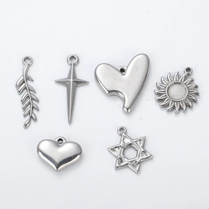 Silver stainless steel pendant set featuring cross, heart, sun and star charms for DIY jewelry