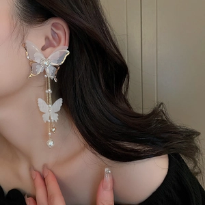 Elegant gold butterfly earrings with white pearls and sparkling crystals for women