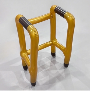 Detailed view of an inflatable walker toy made of golden PVC for party props