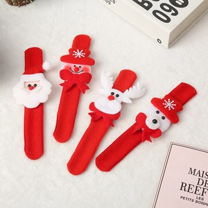 Christmas snap bracelet set featuring Santa, Snowman, Reindeer on white plush background