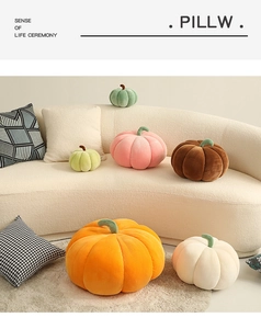 Detailed texture of colorful velvet pumpkin pillows on a cozy sofa setting