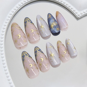 Star and moon themed cat eye press on nails with elegant stiletto shape and gold foil
