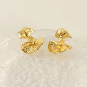 Modern gold-plated stainless steel earrings with irregular hammered petal design