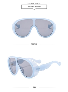 Detailed front and side views of jelly blue oversized rimless shield sunglasses