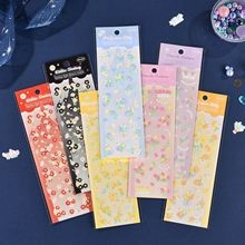 Close-up of colorful glitter stickers for DIY planners with a dreamy laser finish
