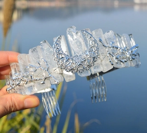 Detail of crystal moon crown with silver branch accents and natural stone elements