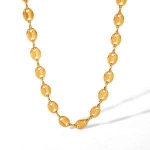 Detail of 18K gold-plated coffee bean link necklace showing smooth metallic texture