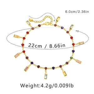 Detail view of gold anklet with colorful gems showing dimensions and length parameters