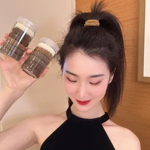 High elasticity hair ties for high ponytails in a clear jar, neutral brown colors