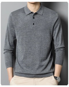Detail of grey knitted long sleeve polo shirt showing collar texture and button placket