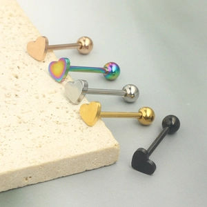 Detailed view of heart-shaped stainless steel barbells in five different metallic colors