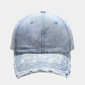 Vintage washed light blue denim baseball cap with distressed brim and six-panel design