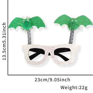 White glitter Halloween glasses frame with spring green bats and fuzzy pom-poms