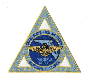 Macro detail of high-density embroidered Naval Aviation patch with vibrant yellow stitching