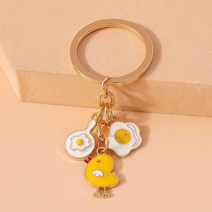 Frying pan fried egg and chick keychain in gold finish for handbags and phones