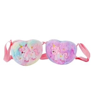 Detail view of heart-shaped plush unicorn crossbody bags with soft rainbow faux fur