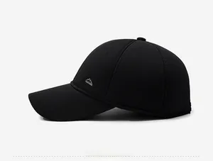 Side view of black wool baseball cap for men featuring a small silver mountain metal logo