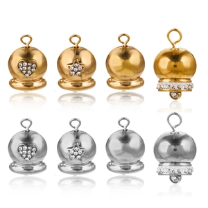 Detailed grid showing gold and silver stainless steel bell charms with crystal inlay