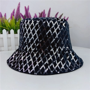 Detailed view of black sequined bucket hat with silver diamond pattern and velvet texture
