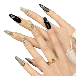 Luxurious long pointed press-on nails with black rose art, golden glitter and crystals