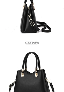Détail d'un sac à main noir en cuir grainé avec ferrures dorées et vue de côté