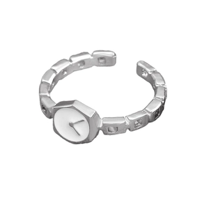 Detailed view of silver watch-style adjustable ring with hexagonal clock face