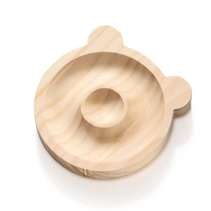 Detail of bear-shaped pine wood bead design tray showing natural grain and dual grooves
