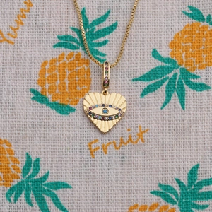 Gold plated evil eye heart pendant necklace with colorful gems on a box chain for women