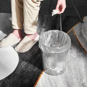 Minimalist transparent desktop trash can in cream style for home and office use
